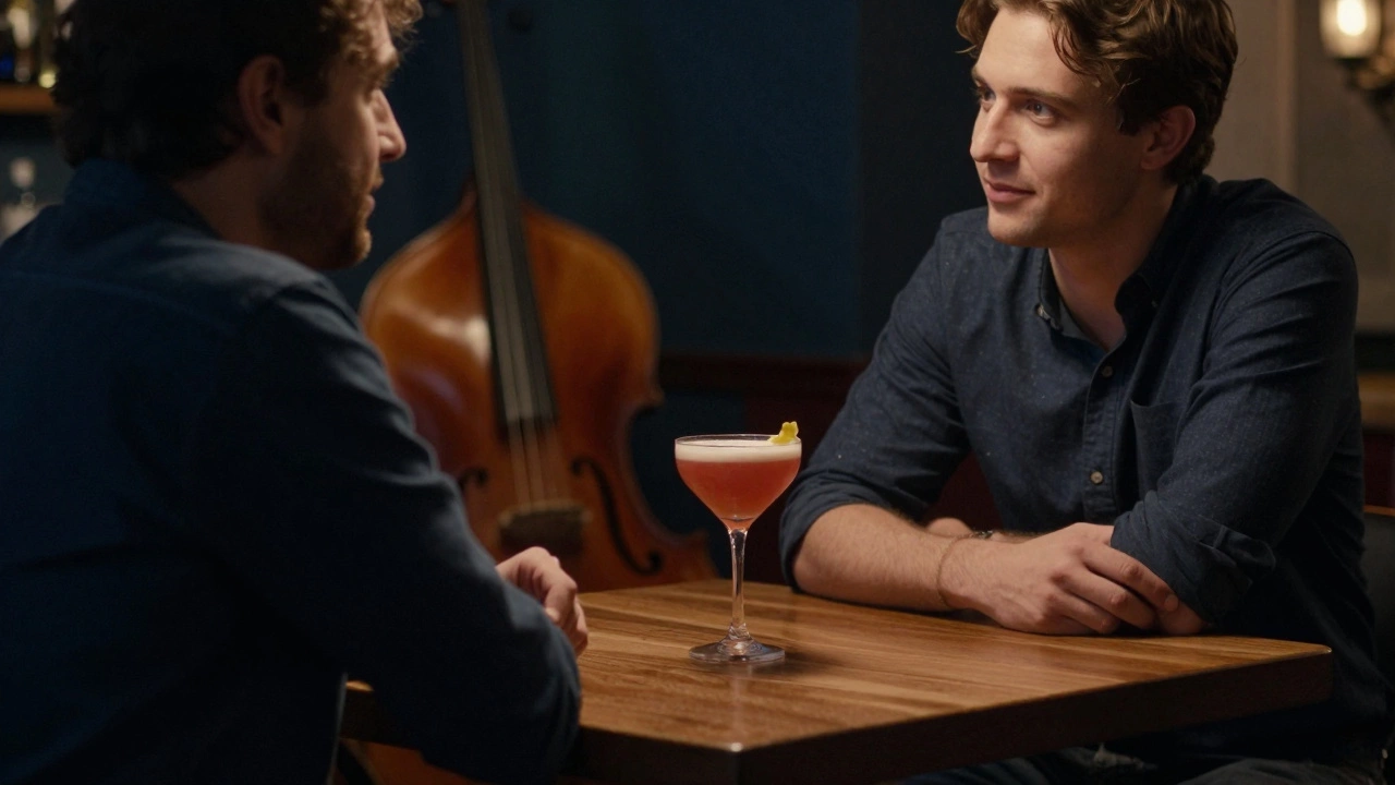 A couple enjoying craft cocktails in a quiet jazz bar in Lille during evening hours.